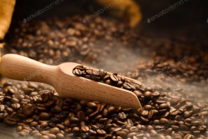 دانه‌های قهوه که داخل یک پیمانه قرار دارند