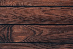 تصویر یک سطح چوبی قهوه ای تیره مخصوص بک گراند