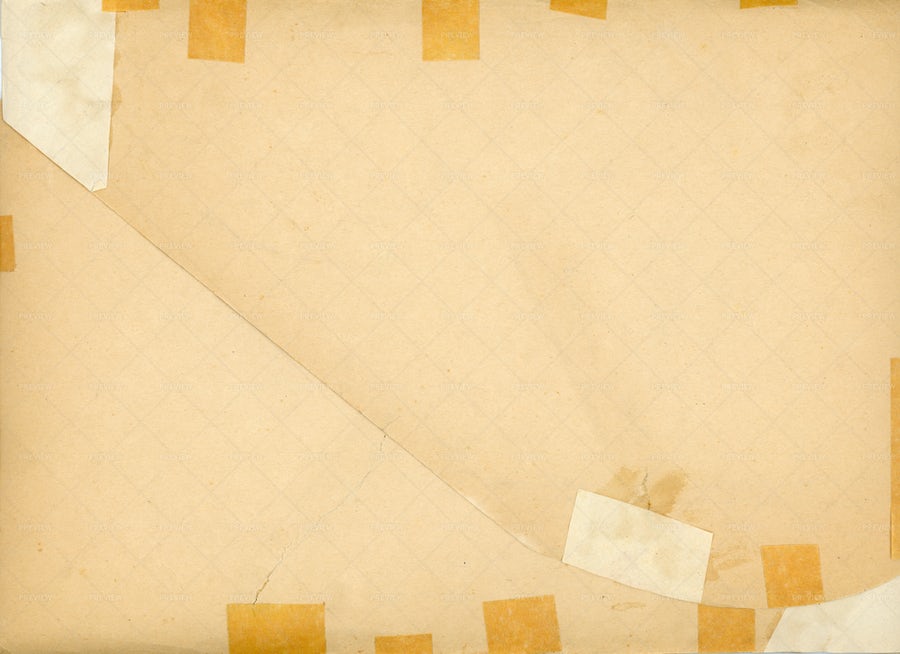 تصویر پس‌زمینه یک کاغذ قدیمی و پر از چسب